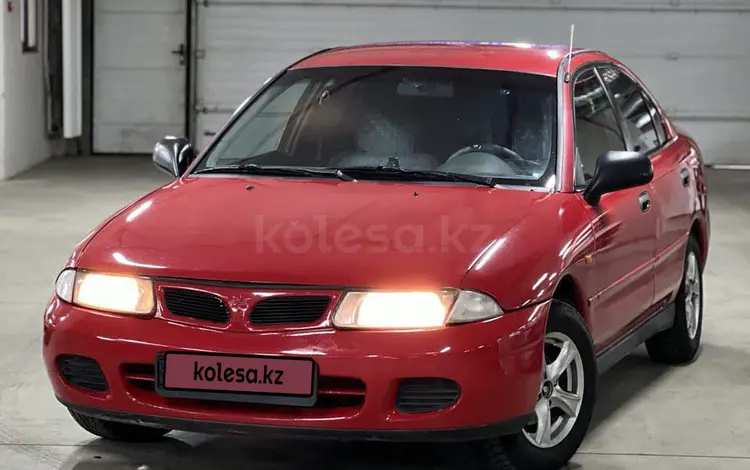 Mitsubishi Carisma 1995 годаүшін2 500 000 тг. в Алматы