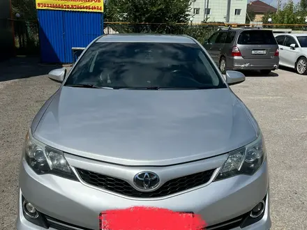 Toyota Camry 2014 года за 8 600 000 тг. в Астана