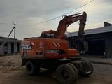 Doosan  DX140W 2010 года за 32 000 000 тг. в Алматы – фото 2