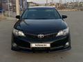 Toyota Camry 2012 года за 8 800 000 тг. в Жанаозен