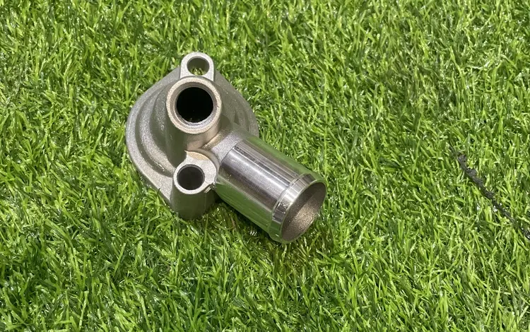 Крышка термостата Mazda 323 за 9 000 тг. в Караганда