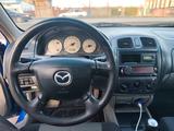 Mazda 323 2002 годаүшін1 900 000 тг. в Шымкент – фото 5