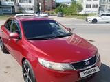 Kia Cerato 2011 года за 4 500 000 тг. в Астана – фото 2
