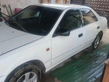 Toyota Camry 1998 года за 2 200 825 тг. в Алматы – фото 22