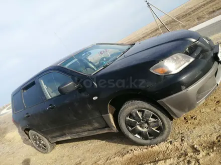 Mitsubishi Outlander 2003 года за 2 000 000 тг. в Актобе – фото 2