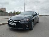 Toyota Camry 2016 года за 9 000 000 тг. в Астана – фото 2