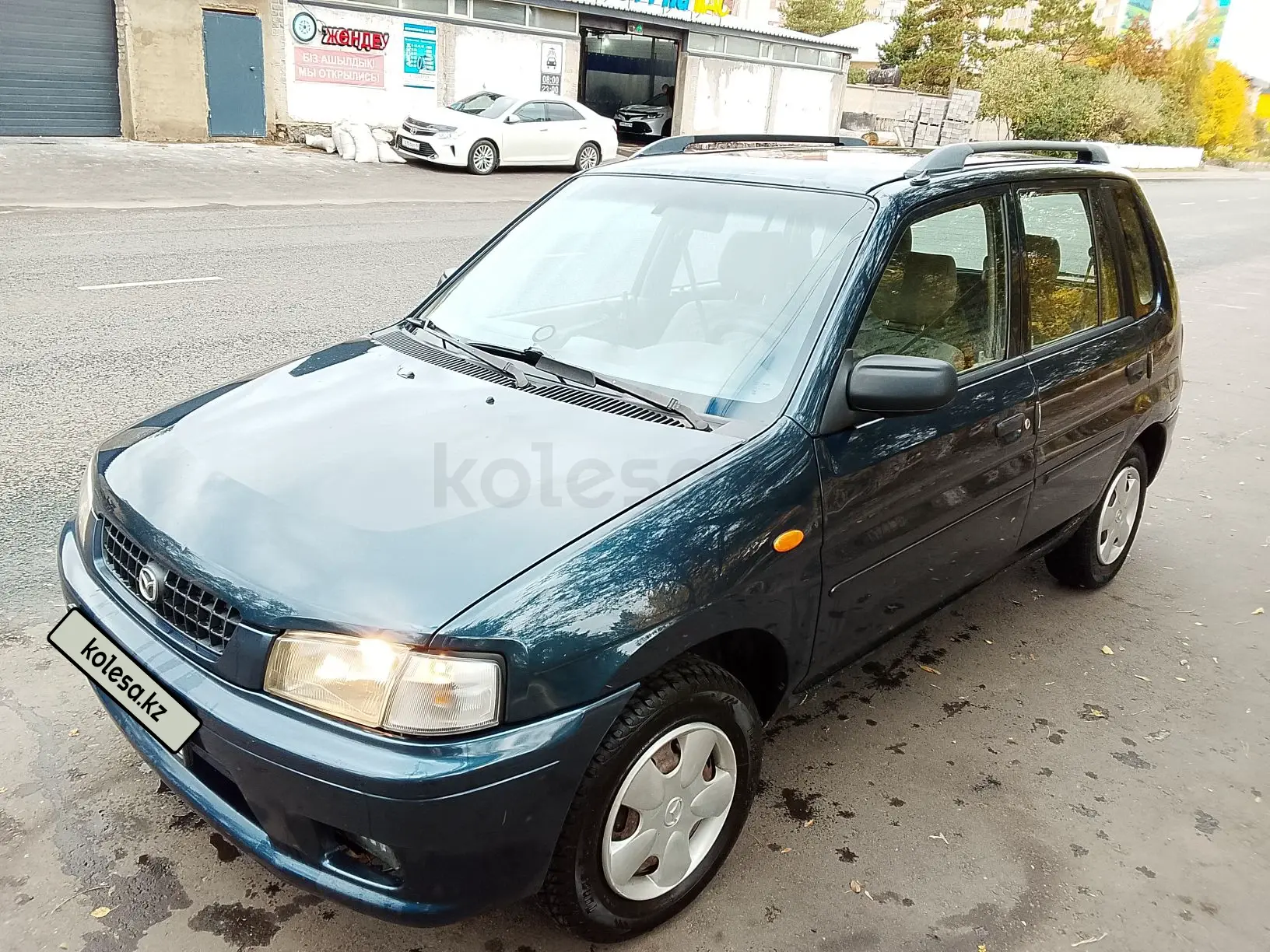 Mazda Demio, 1998