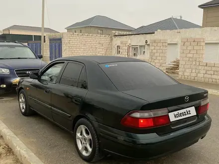 Mazda 626 1998 года за 2 300 000 тг. в Жанаозен – фото 3