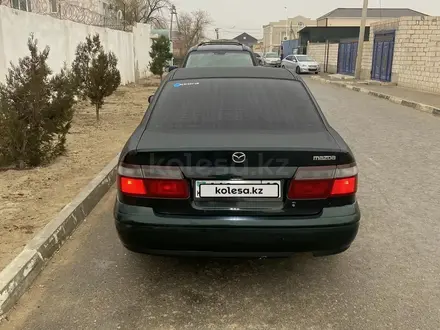 Mazda 626 1998 года за 2 300 000 тг. в Жанаозен – фото 4