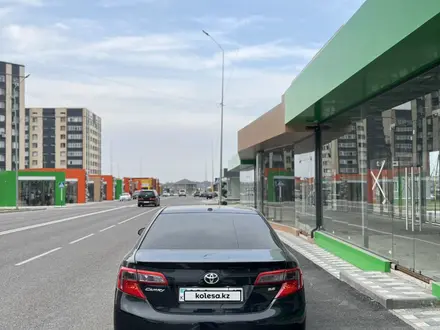 Toyota Camry 2012 года за 7 800 000 тг. в Шымкент – фото 3