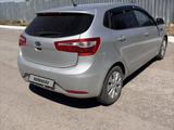 Kia Rio 2012 года за 3 990 000 тг. в Караганда – фото 2