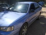 Toyota Carina E 1997 года за 2 100 000 тг. в Актобе – фото 2