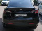 Tesla Model Y 2021 года за 18 600 000 тг. в Алматы – фото 2