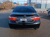 Toyota Camry 2015 года за 6 500 000 тг. в Актобе – фото 4