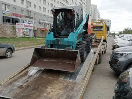 Эвакуатор Астана. Погрузка и выгрузка автомобилей на фуру в Астана – фото 5