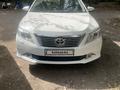 Toyota Camry 2014 годаfor8 514 701 тг. в Алматы