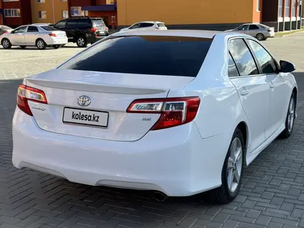 Toyota Camry 2013 года за 9 900 000 тг. в Актобе – фото 7