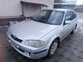 Mazda 323 1999 годаүшін2 400 000 тг. в Алматы