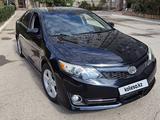 Toyota Camry 2014 года за 7 500 000 тг. в Жанаозен