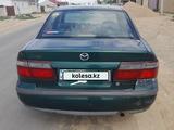 Mazda 626 1998 года за 1 850 000 тг. в Актау – фото 2