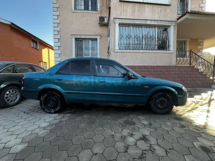 Mazda 323 1998 года за 700 000 тг. в Алматы – фото 4