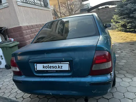 Mazda 323 1998 года за 700 000 тг. в Алматы – фото 6
