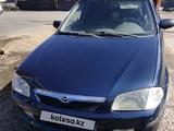 Mazda 323 1998 года за 1 900 000 тг. в Караганда – фото 3