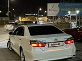 Toyota Camry 2014 года за 11 000 000 тг. в Атырау – фото 5