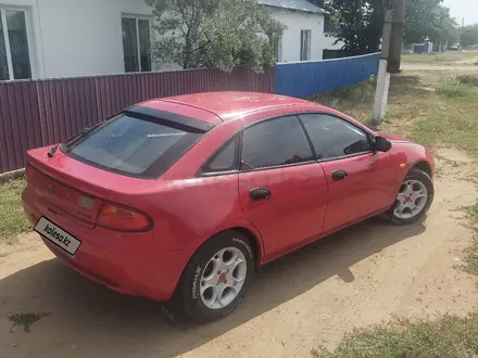 Mazda 323 1994 года за 1 800 000 тг. в Железинка – фото 24