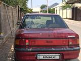 Mazda 323 1994 года за 600 000 тг. в Шымкент – фото 4