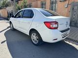 Renault Logan 2014 года за 3 500 000 тг. в Шымкент – фото 3
