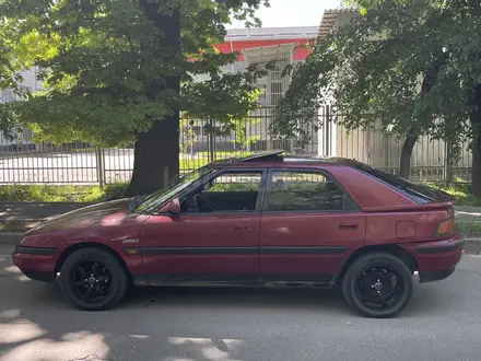 Mazda 323 1994 года за 750 000 тг. в Алматы – фото 4
