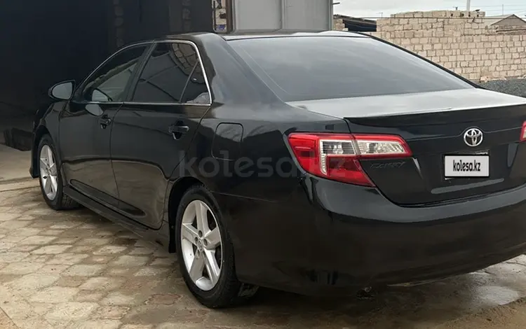 Toyota Camry 2012 года за 5 400 000 тг. в Жанаозен