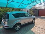 Mitsubishi Outlander 2010 годаүшін5 300 000 тг. в Шамалган – фото 4