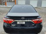 Toyota Camry 2015 года за 6 500 000 тг. в Актобе – фото 4