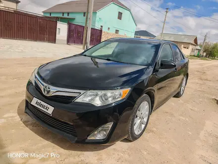 Toyota Camry 2014 года за 6 200 000 тг. в Жанаозен