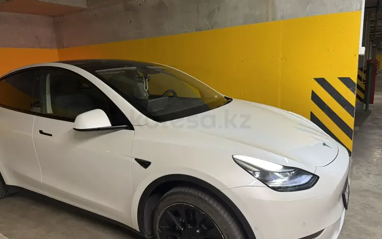 Tesla Model Y 2023 года за 16 500 000 тг. в Алматы