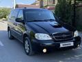 Kia Carnival 2004 года за 3 000 000 тг. в Шымкент – фото 2