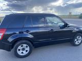 Suzuki Grand Vitara 2011 года за 6 500 000 тг. в Караганда – фото 2