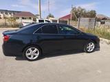 Toyota Camry 2014 года за 7 200 000 тг. в Жанаозен – фото 2