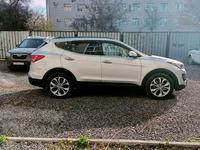 Hyundai Santa Fe 2013 года за 9 600 000 тг. в Актобе