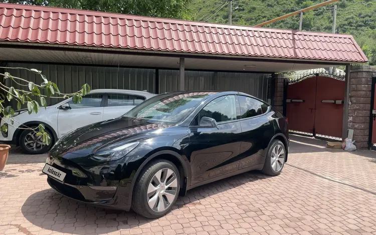 Tesla Model Y 2023 года за 22 040 404 тг. в Алматы