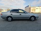 Toyota Carina E 1997 годаүшін2 850 000 тг. в Актау