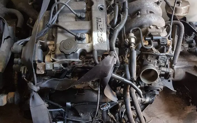 Двигатель на Mazda 626 год 1998, коробка механика. за 100 тг. в Алматы