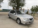 Mazda 323 2003 года за 799 999 тг. в Атырау – фото 2