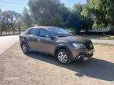Renault Logan 2020 года за 5 300 000 тг. в Караганда – фото 4