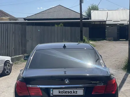 BMW 750 2011 года за 9 000 000 тг. в Алматы – фото 4