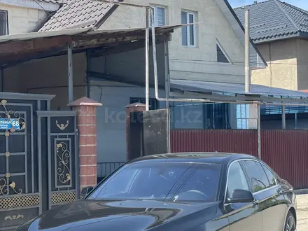 BMW 750 2011 года за 9 000 000 тг. в Алматы – фото 3