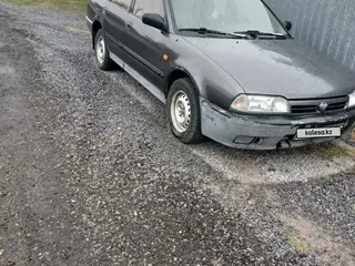 Nissan Primera, 1990