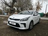 Kia Rio 2018 года за 7 200 000 тг. в Актобе – фото 2